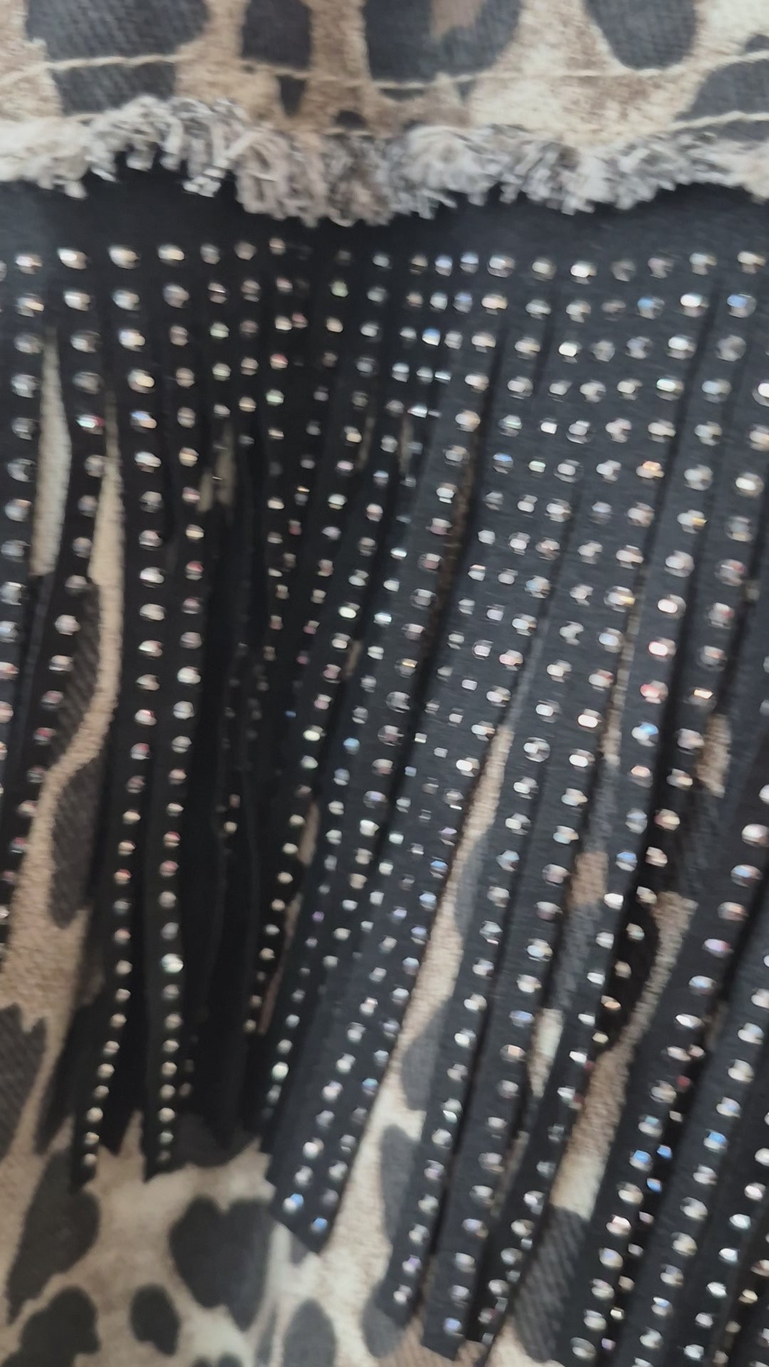 Chaqueta animal print flecos