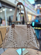 Cartera Voyage tachas