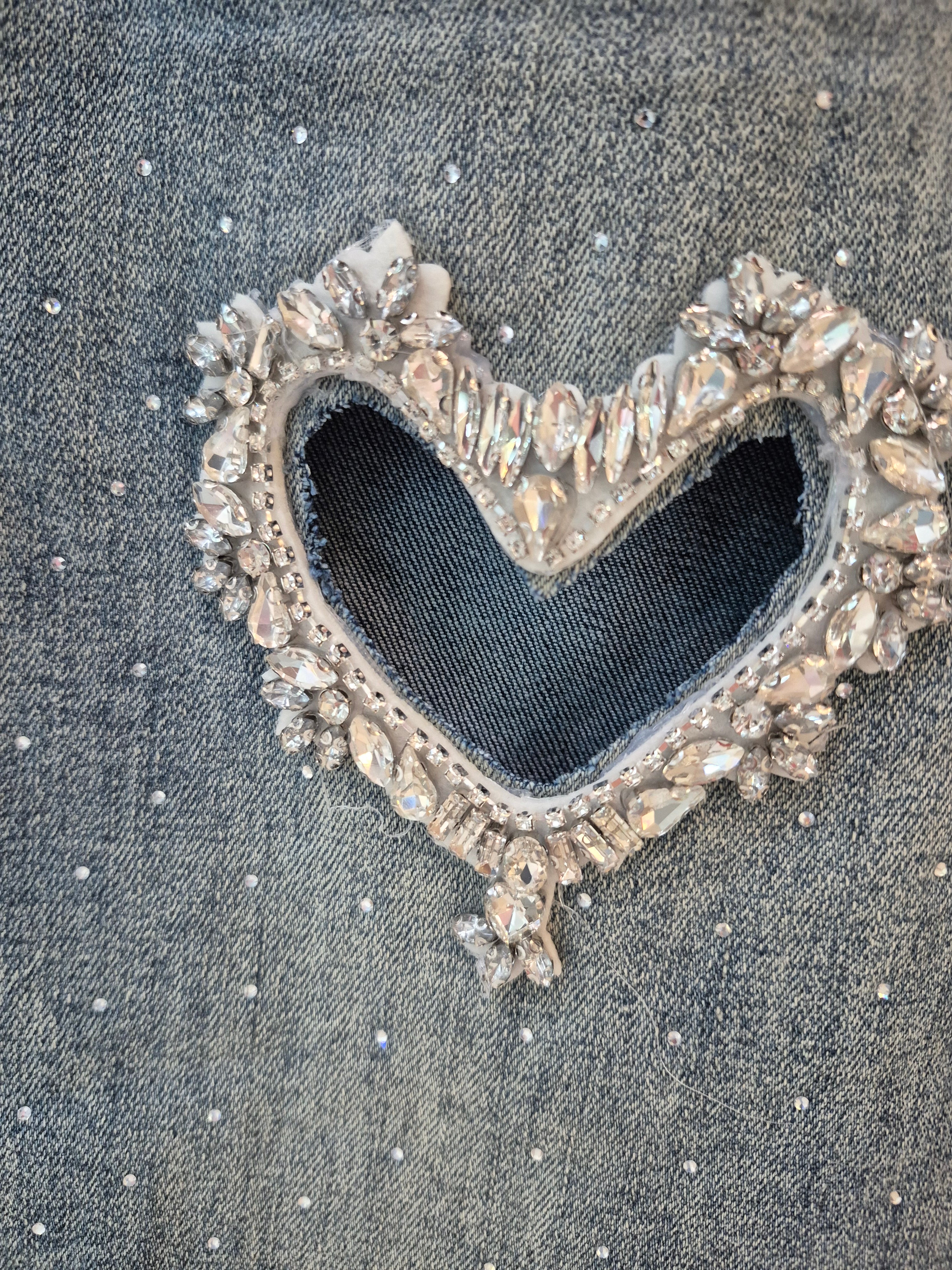 Jeans corazón calado