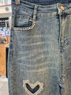 Jeans corazón calado