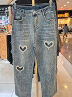 Jeans corazón calado