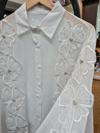 Camisa transparente flor strass